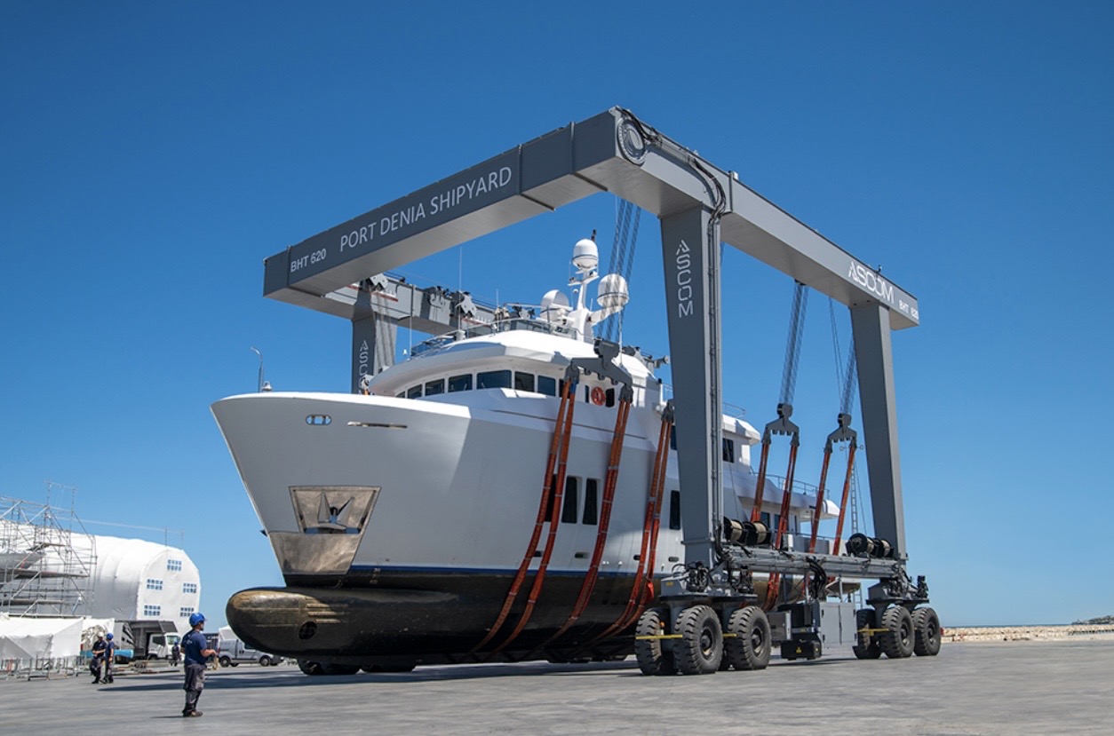 Superyacht in the travel lift at Port Denia Shipyard